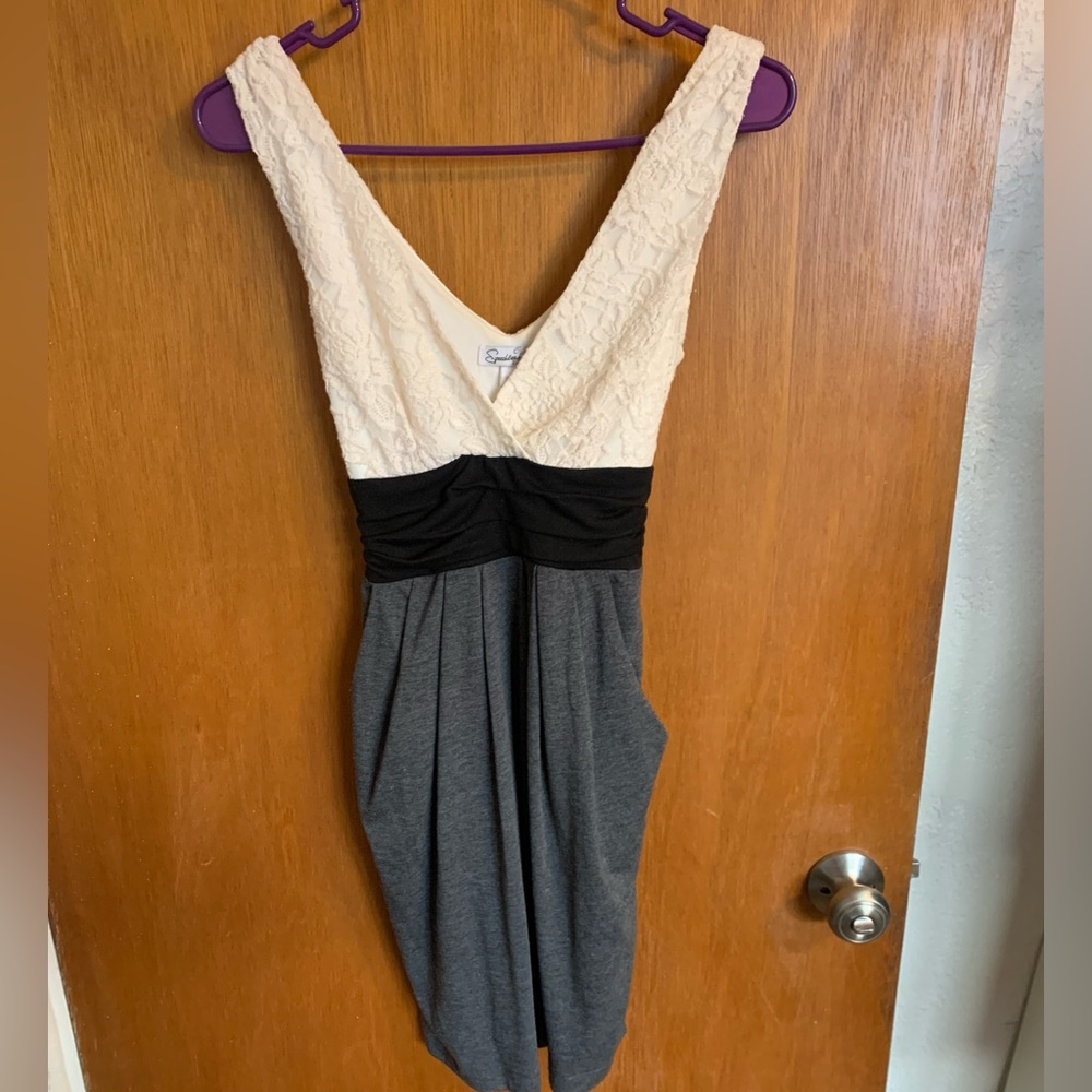 Super cute dress with black waist tie. Ivory lace top and soft cotton bottom.